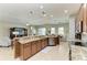 Spacious kitchen with granite countertops, stainless steel appliances, and an open layout perfect for entertaining at 5319 120Th E Ave, Parrish, FL 34219