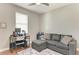 This comfortable office features a gray sofa, desk, and plush rug, ideal for working from home at 5319 120Th E Ave, Parrish, FL 34219