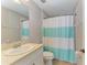 Bathroom featuring a vanity, sink, toilet, shower/tub combination, and gray paint at 5420 River Sound Ter, Bradenton, FL 34208