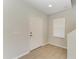 Bright entryway featuring tile flooring and a view of the staircase at 5420 River Sound Ter, Bradenton, FL 34208