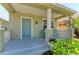 Inviting front porch with space for seating and charming curb appeal at 5420 River Sound Ter, Bradenton, FL 34208