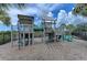 Community playground with climbing structures, slides, and a soft ground covering for safety at 5420 River Sound Ter, Bradenton, FL 34208
