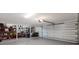 Spacious garage with ample storage space and an automatic door at 5581 Shadow Lawn Dr, Sarasota, FL 34242