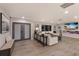 Spacious living room with modern fireplace and large windows for natural light at 5581 Shadow Lawn Dr, Sarasota, FL 34242