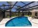 Relaxing screened-in pool and patio area for ultimate outdoor enjoyment at 5581 Shadow Lawn Dr, Sarasota, FL 34242