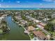 Waterfront property with a private dock and pool, nestled in a serene neighborhood at 572 Commonwealth Ln, Sarasota, FL 34242