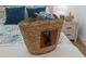 Bright bedroom featuring a beach bag with sunglasses and a coastal-themed nightstand at 572 Commonwealth Ln, Sarasota, FL 34242