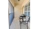 Relaxing balcony with comfortable seating and serene ambiance, perfect for enjoying a quiet moment at 600 Mirabella Cir # 201, Venice, FL 34292