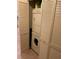 Conveniently located, the laundry closet features a stacked washer and dryer for efficient use of space at 600 Mirabella Cir # 201, Venice, FL 34292