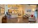 Open-concept living space with natural light, comfortable seating, and stylish decor, ideal for relaxation and entertaining at 600 Mirabella Cir # 201, Venice, FL 34292
