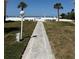 Direct beach access with sidewalk and beach amenities for a relaxing experience at 6006 Midnight Pass Rd # 48, Sarasota, FL 34242