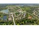 Scenic aerial view of the neighborhood with ponds, lush landscaping and easy highway access at 6032 36Th E Ct, Ellenton, FL 34222