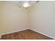 Neutral bedroom with wood floor, ceiling fan, and natural light at 664 Planters Manor Way, Bradenton, FL 34212