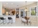 Cozy breakfast nook with a window and sliding door leading to the backyard at 664 Planters Manor Way, Bradenton, FL 34212