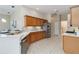 Spacious kitchen with modern appliances and plenty of cabinet space for storage at 664 Planters Manor Way, Bradenton, FL 34212