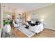 Bright and spacious living room featuring elegant furnishings and a welcoming atmosphere at 664 Planters Manor Way, Bradenton, FL 34212