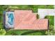 An aerial view showing the home's layout, private pool, tile roof and well-manicured landscaping at 706 Misty Pond Ct, Bradenton, FL 34212