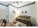 Cozy bedroom with a daybed, stylish decor, and ample natural light at 706 Misty Pond Ct, Bradenton, FL 34212