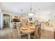 Open-concept dining area connects to the living room and kitchen for easy entertaining at 706 Misty Pond Ct, Bradenton, FL 34212