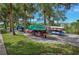 Community kayak storage racks provide an area to store and launch personal watercraft in a lush, tropical setting at 706 Misty Pond Ct, Bradenton, FL 34212