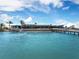 Scenic view of the restaurant from the water, featuring a dock and modern architectural design at 730 Spanish S Dr # 99, Longboat Key, FL 34228