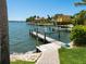 Private boat dock with lift provides direct access to the water at 7614 Peninsular Dr, Sarasota, FL 34231