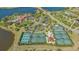 Aerial view of the community with tennis courts, lakes, and clubhouse at 7838 Bowspirit Way, Lakewood Ranch, FL 34202