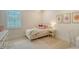 Bright bedroom with natural lighting, pastel accents, and minimalist decor for a calming atmosphere at 7838 Bowspirit Way, Lakewood Ranch, FL 34202