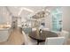 Cozy dining room connected to a stylish kitchen and living area offering an inviting space for gatherings at 7838 Bowspirit Way, Lakewood Ranch, FL 34202