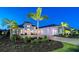 Stunning home exterior with a multi-car garage, brick driveway and meticulous landscaping at 7838 Bowspirit Way, Lakewood Ranch, FL 34202