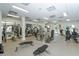 Well-lit community gym featuring modern exercise equipment, multiple machines, and mirrors at 7838 Bowspirit Way, Lakewood Ranch, FL 34202