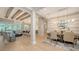 Open-concept living and dining area with modern lighting and an expansive view at 7838 Bowspirit Way, Lakewood Ranch, FL 34202