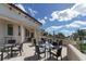 Outdoor patio with tables and chairs, perfect for entertaining at 7838 Bowspirit Way, Lakewood Ranch, FL 34202