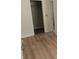 Bedroom with new flooring, closet, and neutral paint at 8040 Canterbury Cir, Seminole, FL 33777