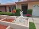Close-up of charming single-story home with well-manicured lawn and inviting curb appeal at 8040 Canterbury Cir, Seminole, FL 33777