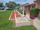 Charming single-story home with a well-manicured lawn and inviting curb appeal at 8040 Canterbury Cir, Seminole, FL 33777