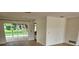 Bright living room with sliding glass doors leading to the backyard at 8040 Canterbury Cir, Seminole, FL 33777