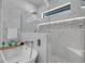 Luxurious bathroom with a modern soaking tub, walk-in shower, and stylish vanity at 805 Padua Ct, Nokomis, FL 34275
