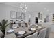Open-concept dining room flowing into a modern kitchen, perfect for entertaining at 805 Padua Ct, Nokomis, FL 34275