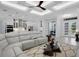 Bright, open-concept living room flowing into the kitchen, perfect for entertaining and modern living at 805 Padua Ct, Nokomis, FL 34275