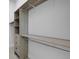 Spacious walk-in closet with custom shelving and ample storage, keeping you organized at 805 Padua Ct, Nokomis, FL 34275