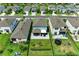 Captivating aerial view showcases the well-maintained backyard with ample space for recreation in a Gathering friendly neighborhood at 8940 Royal River Cir, Parrish, FL 34219