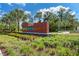 Community entrance sign for North River Ranch with vibrant landscaping at 8940 Royal River Cir, Parrish, FL 34219