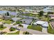 Aerial view of waterfront homes in a Florida community showcasing their proximity to the water and neighborhood layout at 965 E Gondola Dr, Venice, FL 34293