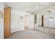 This bedroom has neutral carpet and features closet and ensuite bath access at 965 E Gondola Dr, Venice, FL 34293