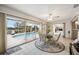Charming dining area with backyard pool view and tile flooring, great for entertaining at 965 E Gondola Dr, Venice, FL 34293