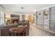 Bright and airy living room featuring a fireplace, built-in shelving, and elegant decor at 965 E Gondola Dr, Venice, FL 34293