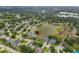 Aerial view of community and location of the property near lake at 11022 Pine Lilly Pl, Lakewood Ranch, FL 34202