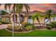 Well-maintained single-Gathering home with mature landscaping and a beautifully manicured lawn at 11022 Pine Lilly Pl, Lakewood Ranch, FL 34202