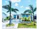 Charming home featuring a well-maintained exterior with a sunny patio and tropical landscaping at 1010 49Th W Ave, Bradenton, FL 34207